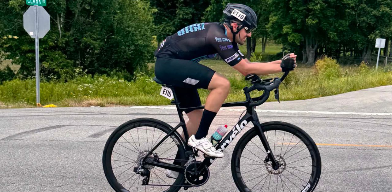 A photo of Cyclist David Maynard cycling in the Race Across the East endurance race